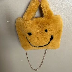 fuzzy smiley face bag